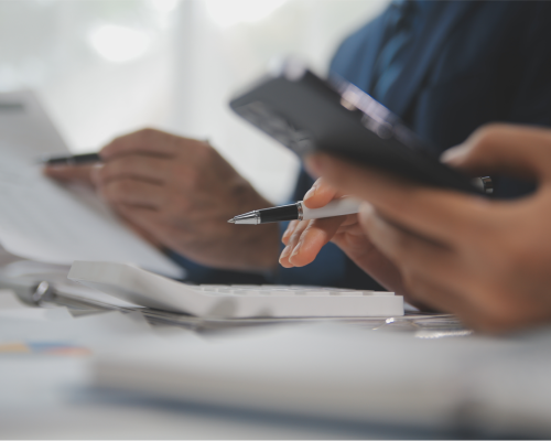 notes and calculator in hand